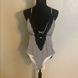 Cupshe Black and White One Piece Swimwear with Sleek Silhouette